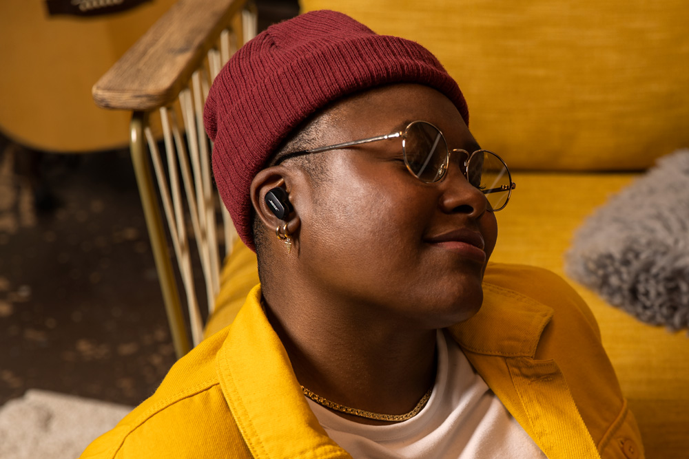 lady listening music with earbuds