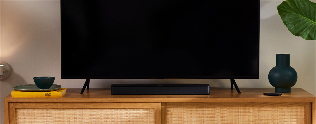tv speaker with tv on a tv stand