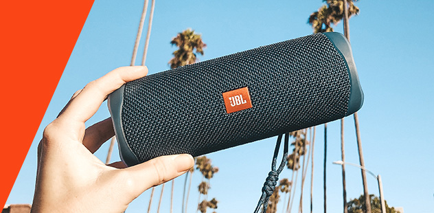 couple using JBL over-ear blue headphone couple using JBL over-ear blue headphone